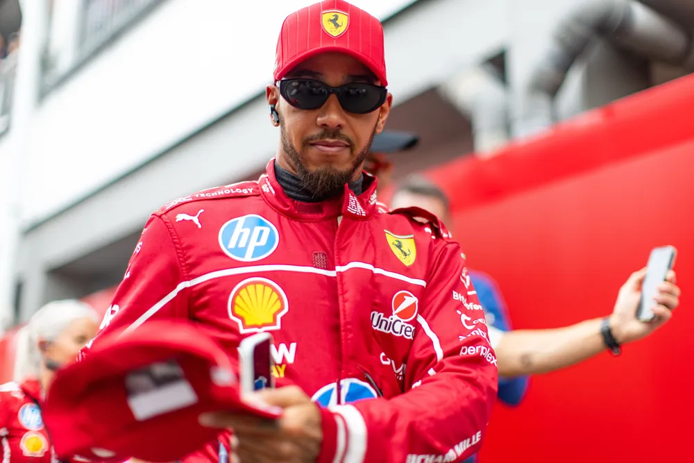 lewis-hamilton-of-great-britain-and-ferrari-walks-in-the-news-photo-1760371962
